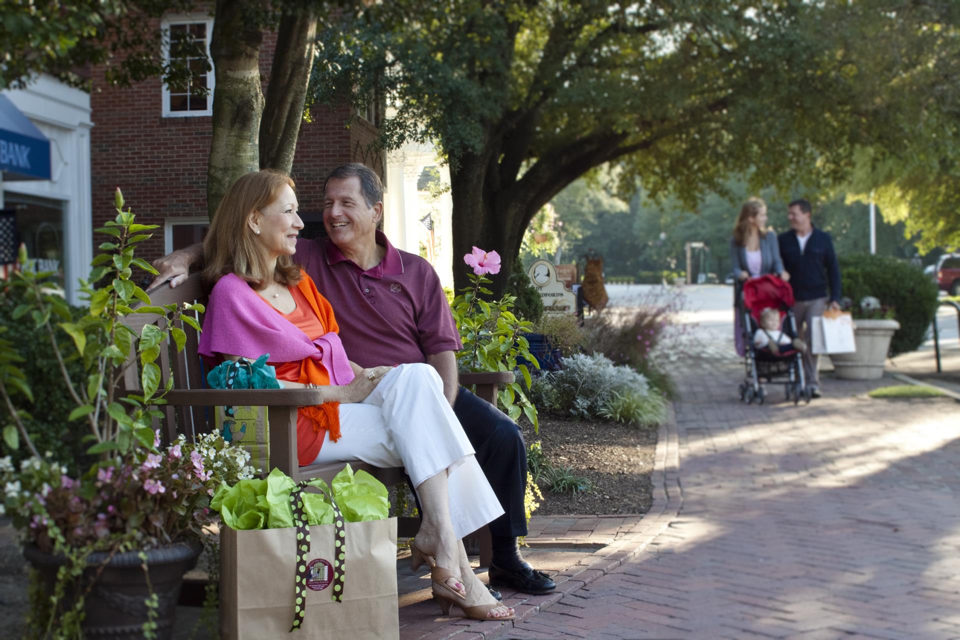 People on bench downtown